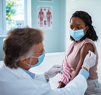 woman getting vaccine
